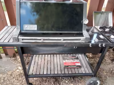One weber barbecue great condition comes with 12 ft hose connects to natural gas asking 150 obo