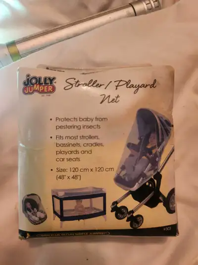 Keep your little one safe from pesky insects with this Jolly Jumper stroller and playard net, design...