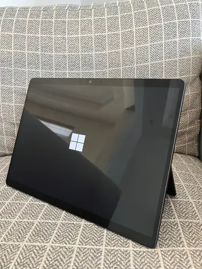 Surface Pro 8 with charger and Surface Slim Pen 2. Surface has an Intel Core i7-1185G7, 16gb LPDDR4x...
