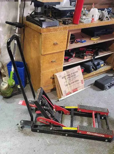 MotoMaster motorcycle jack works like new.$100.