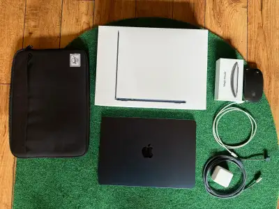 Bought new June 2024. Herschel case and Apple Magic Mouse included. Can transfer Apple Care as well....