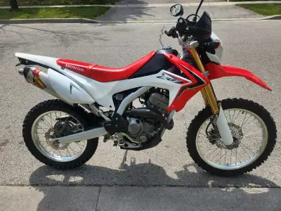 2014 Honda CRF250l (Dualsport) It comes with: - Renthal bars - Kenda k270 New Rear tire (installed 2...