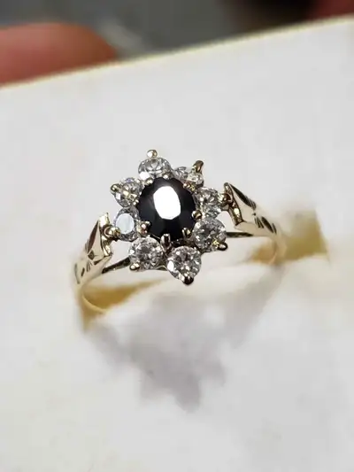 Beautiful old ring one saphire and diamonds set in 14k gold size 6 asking 300 cash or trade for scra...