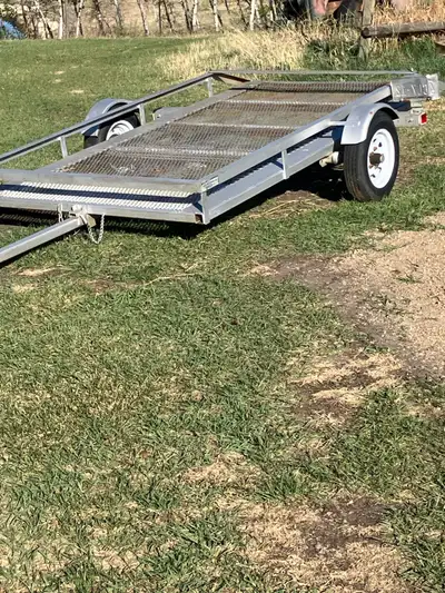 2014 ezgo golf cart and trailer. Batteries are good and comes with charger