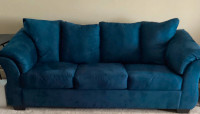 Like new couch.vibrant blue.Adds  to any decor.