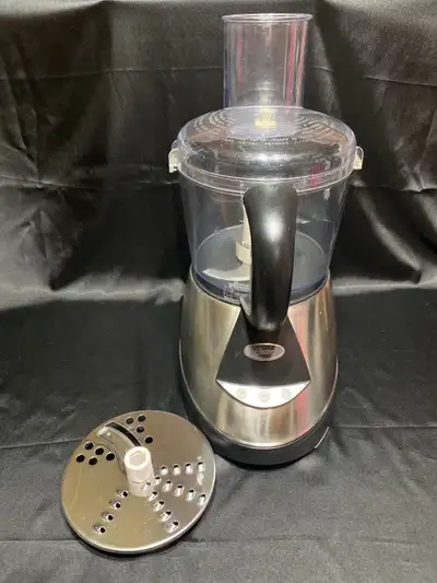Available if posted. Stainless steel Oster food processor. Very good quality and great condition. Pr...