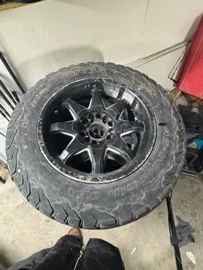 18 in rims. 1 has a crack that leaks. 255/70r18 kos both used. 1/8 ish tread left. Came off 2010 sie...