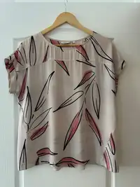 TWO women’s size large summer tops