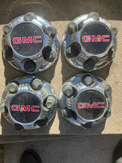 GMC hubcaps 6 bolt style. Call or text 403-560-4507. Located in Southwest Calgary