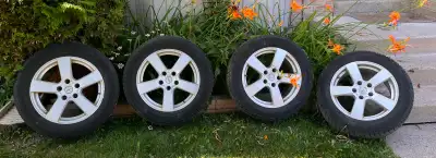 Selling a complete set of 4 Michelin X‑Ice winter tires mounted on Enkei/RMC alloy rims, size 225/55...