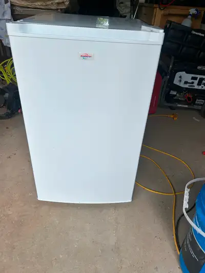 Upright mini deep freezer., View more