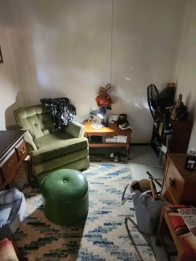 A furnished bedroom in a single family home. Share bathroom, laundry and kitchen with home owners. M...