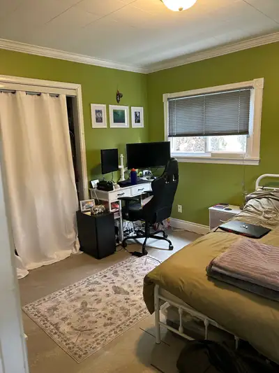 This is the largest bedroom in a 3 bedroom house, with two other female tenants and a small service...