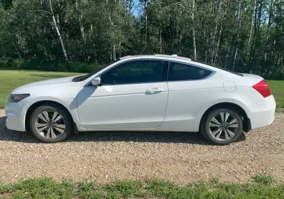 2012 Honda Accord Coupe 2.4L 4-cyl engine Low km for the year, 240000, it is my current daily so km...