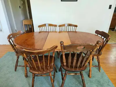 Table with removable leaf. Solid wood. 37 inches wide 28.5 inches high. 67 inches long with leaf and...