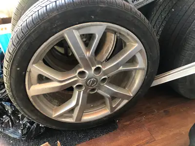 Selling a set of 4 used tires(245/40/19) that are currently on steal rims. Came off of a 2012 Nissan...