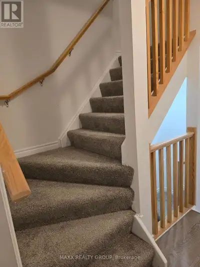 Modern stacked townhouse ! END UNIT VERY BRIGHT WITH MORE WINDOWS This townhouse offers high ceiling...