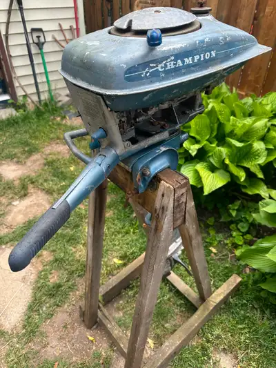 Champion - single-cylinder 4.2 horsepower outboard motor from early 1950's. In working condition.