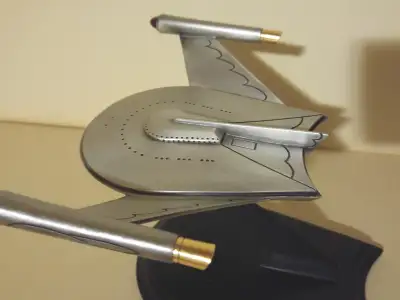 STAR TREK ROMULAN BIRD OF PREY. This is a 1990 Franklin Mint hand-chased fine pewter Romulan flagshi...