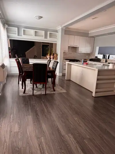 This beautifully maintained townhouse features a bright, open-concept living and dining area with mo...