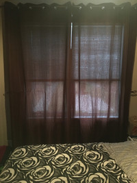 2 BROWN GROMMET CURTAIN PANELS 52”W X 84”L IN GOOD CONDITION