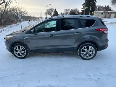 Low milage 2013 AWD Ford Escape titanium with 2L ecoboost engine in excellent condition. Loaded with...