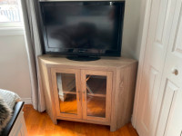 Corner tv stand and tv also