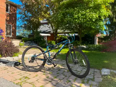 Price is negotiable. Has a front suspension and 4-bar link rear suspension system , smooth shifting...
