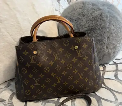 100 percent authentic Louis Vuitton Montaigne mm. $1,200 or best offer!