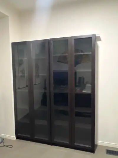 Add a touch of elegance to your space with these used but well-maintained IKEA Billy Bookcases with...