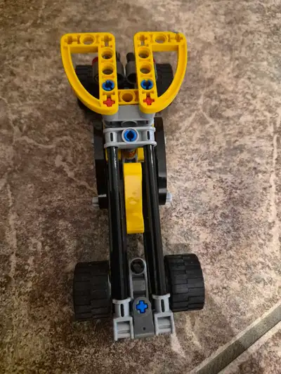 This is a used Lego set 8290, a classic Technic model car and can be built into mini forklift. Here...