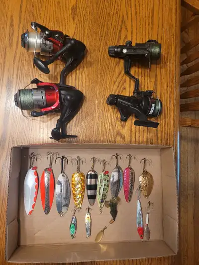 Four fishing reels Two Berkley reels,large no size on them but looks like size 5000 or bigger. One v...
