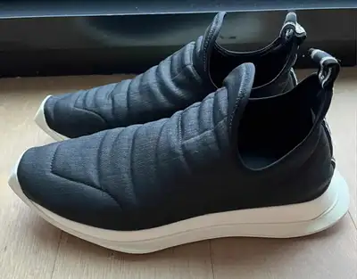Rick Owens Drkshdw Runner Slip-On Sneakers Coated twill slip-on sneakers in black Square toe Top sti...