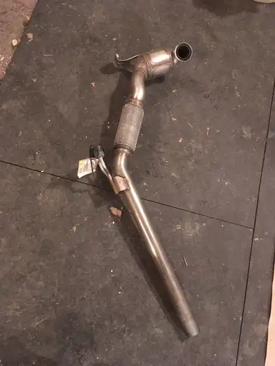 Catalytic Converter, brand new from VW. Only fits 2006 Jetta TDI. Paid $1200 new, will sell for half...