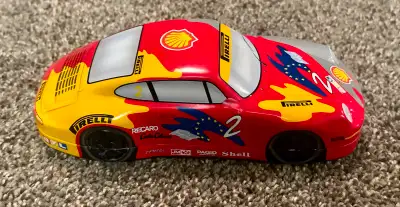 Tinplate Product Bristol 1997 Porsche 911 tin. Located in Spruce Grove