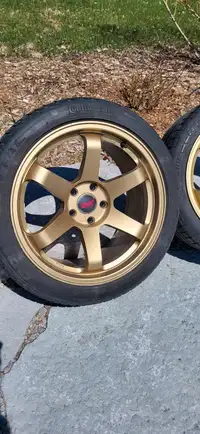 Subaru STi Rota wheels.