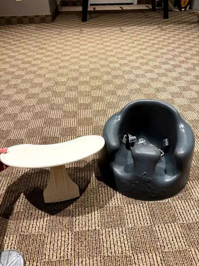 Almost new used handful of times Bumbo floor/sear with strap and tray