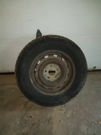 Set of four winter tires on rims off a 2011 Dodge Journey SXT. Used one winter, size is 225 70 r16,...