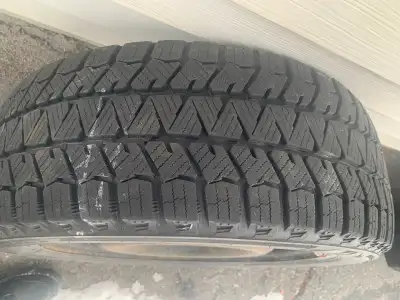Only used for 1 season on rim ready to install on vehicle already balanced get traction in freezing...