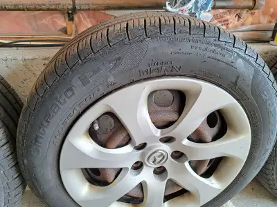 I am selling a set of four pre-owned Pirelli Cinturato P7 all-season tires, sized 205/55 R16, mounte...