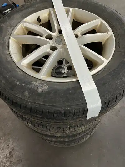 Amazing dodge caravan rims and tires 8/32 Lots of tread