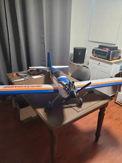 Avion Escapade60 en excellent état 68" d'aile, avec super moteur OS .95 4temps dernière génération c...