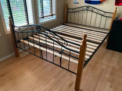 Wood and black metal queen bed frame