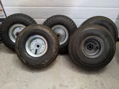 Front 2 - 10in dia. 4.10 x 4 wheels with air tires. 5/8in bearing holes. Replacement for 2 wheelers...