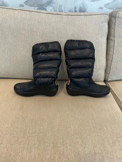 Woman’s black winter boots Moncler, View more