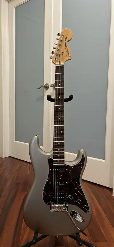 Fender Stratocaster Deluxe HSS. Upgraded new 4 ply brown tortoise plckguard, upgraded new black volu...