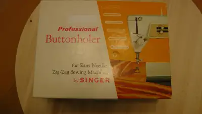 VINTAGE PROFESSIONAL BUTTONHOLER for slant needle zig-zag sewing machines by Singer, still in the or...