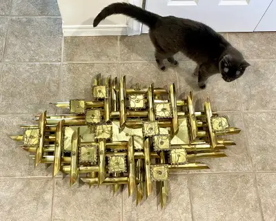 Elevate your home decor with this stunning 1980s SIMILAR TO Curtis Jere Mid Century Modern metal wal...