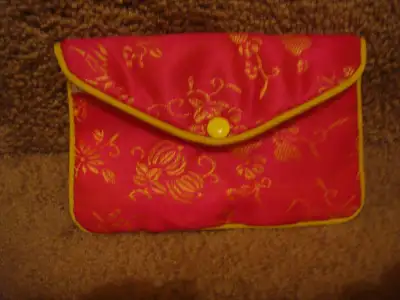 Approximately 5 1/4" x 3 1/2" Zipper pocket with fold over snap flap. Offers considered.