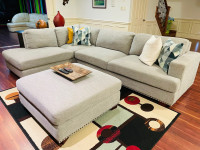Gray sectional sofa with ottoman 